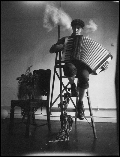 The forth is of a photograph of a busker, who played in one of the main coffee strips. His name is William, and he’s an accordionist. I approached him after he stopped playing, gave him five bucks, and asked if he'd come to my place at the Nicholas, so I could take his picture. We made a little set, and I took the photograph. You'd most likely still find him on Centre way playing his red accordion. Polaroid 350 - Type 100 B&W