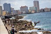 Mid Afternoon on The Malecón – This is the place to be, teenagers can get a reprieve from the stifling afternoon sun and a chance to socialise and laze around on the rocks, meanwhile the more daring youths dive into the Gulf of Mexico waters without any caution for their well-being. Momentarily oblivious to that mighty land merely 100 miles to the north who for the past 50 years has helped prevent any kind of real progress.: by jaddlem, Views[782]
