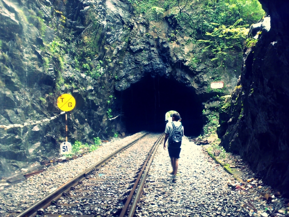 This photograph is combined with both nature & man made subjects such as the train track with indication signs through the rocky mountain caught my eye. At the end of the tunnel after a long trek is our destination! 