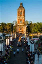 4.	Two Icons (Jaro Belfry and San Pedro Calungsod). The old belfry of the Cathedral of the Roman Catholic Church in Jaro in Iloilo City is an iconic symbol of Catholicism in Iloilo. It stood high enough to be seen by everyone who passes in the area. In this picture, it serves as background for the arrival to Iloilo of the image of San Pedro Calungsod, the second Filipino saint. The picture also shows the faithful uniting to welcome the saint. The setting sun highlighted both icons.: by jagunap, Views[1275]