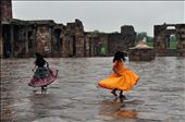 Two young girls play among ruins after a rainy morning.: by jailakhani, Views[280]