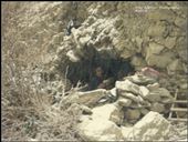 Abode, snowfall, shelter & Buddhist prayers.

Small hidden caves, such as this one, found in selected turns in the gorges are home to trekkers and local Ladakhis on the move. It was mostly a case of first come first serve, except there is no one to serve you except yourself. The protection from the fierce cold and wind is the major enticer to these caves. A local man, making the perilous journey from Nerak (a village, meaning Hell in English) to Leh, Ladakh for selling Yak wool can be seen reading some Buddhist prayers through the snowfall. The Buddhist believers say these prayers help them survive in such extreme conditions where temperatures dipping to -30 degrees centigrade is a common phenomenon.: by jajaborthenomad, Views[463]