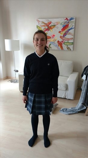Maya in her school uniform