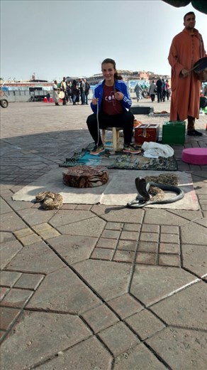 Maya with the snake charmers in Jemaa el-Fnaa square