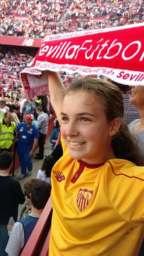 Maya at the Sevilla FC game during the singing of the anthem