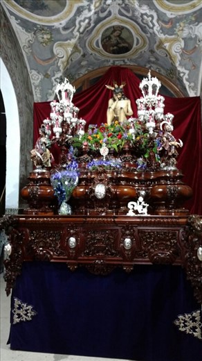 Each paso is decorated with fresh flowers