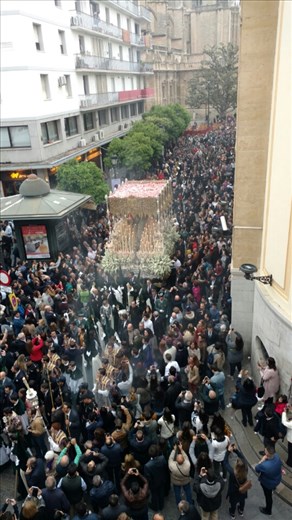 The Virgin of Esperanza de Triana, with huge crowds at 7:30am. Note the rose petals thrown down on her