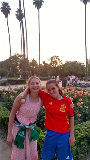 Maya, Helena, the sunset, and the roses