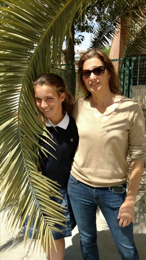 Beth and Maya hiding in the palms