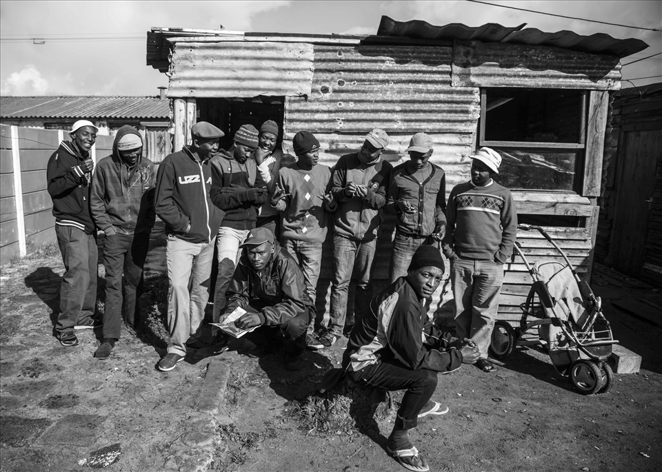 South Africa's townships are infamous for violence, and Gugulethu is no exception. After this photo was taken, Waqa called me asking for a copy. While Waqa has left violence behind, he said most of these young men had gotten drunk and been arrested later that night for the brutal beating death of a township man. The dead man’s crime: not handing over his cell phone quickly enough during a robbery. Waqa wanted a memory.