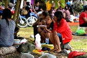 Zamboanga City, Philippines is surrounded with shorelines. Zamboangueños tend to celebrate most occassions on the beach. This is New Year's Day on Ebenezer Bible College Beach. Families gathered to reconnect with each other. On this photo, a family having their meal with only a rock or a log of wood to sit on.: by jalokivi, Views[676]