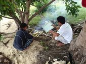 Lads cooking the results of a slow days fishing. Puerto Barton, Palawan: by jambopablo, Views[507]