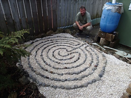 Labyrinth I created from my Dad's old one. Cut out the template & laid river stones over limestone chips.