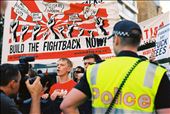 A young man stands at the front of the pack chanting, demanding change.: by james_ross, Views[189]