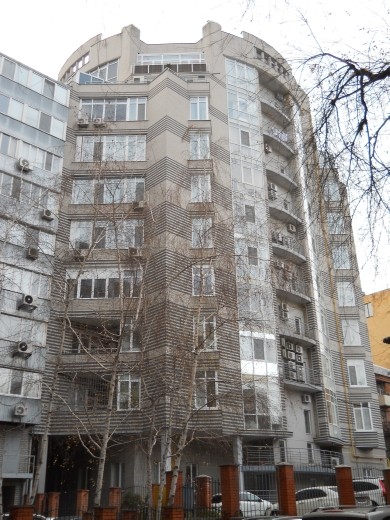 Apartment building near the school. This building sits among many so-called Soviet Block Apartments.
