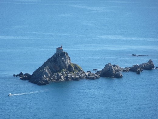 Church perched on rocks in the Adriatic