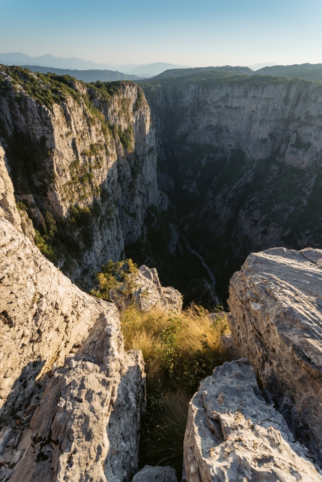 Vikos Gorge is in the Guiness Book of Records as the deepest gorge in the world with a drop of 1000m at its deepest point. 

We visited this place and was in absolute awe, it was so hard to capture a shot that showed the scale.