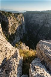 Vikos Gorge is in the Guiness Book of Records as the deepest gorge in the world with a drop of 1000m at its deepest point. 

We visited this place and was in absolute awe, it was so hard to capture a shot that showed the scale.: by jamesgrant, Views[1158]