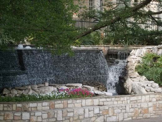 Small waterfalls throughout the River Walk