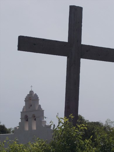 Nice photo of the Mission from behind a Cross