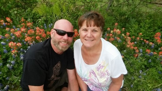 Us in a a field of Texas Bluebonnets and Paintbrushes