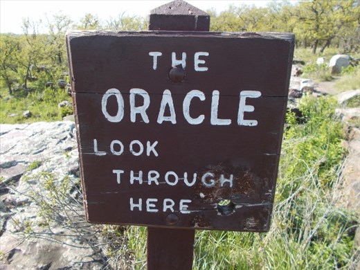 The Oracle Signage with Viewing Hole