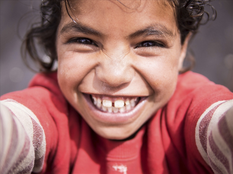 Having spent six weeks in the company of these people it is hard to ignore the happiness that seems to permeate their daily lives. Smiles are rarely given half-heartedly. This girl was never without a contagious lightness that infected everyone around her and it’s a quality shared to varying degrees in all the Bedouin children. Their mischievous sense of fun is hard to avoid and why would you want to? This photo was taken during a session sewing up the families’ traditional tent, she wouldn’t stop cracking jokes and being funny. If ever there was an inauspicious opportunity to capture happiness maybe a daily chore was it.