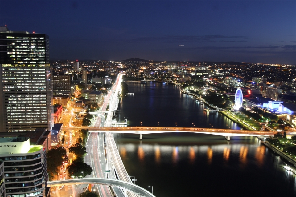 Brisbane City at sunset, captures major roads of Brisbane that connect with the river, taken 38 floors above Brisbane CBD.