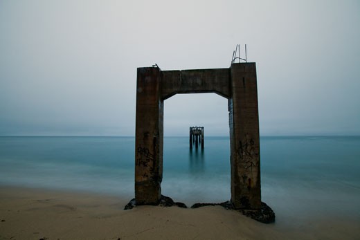 The remains of an old pier stand like sentries along the Davenport coastline
