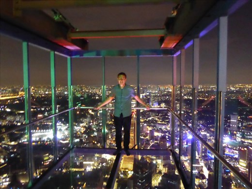 Jason on the glass floor at the KL Tower