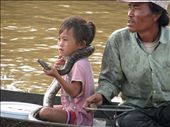 Vietnamese refugees on Cambodian river selling tourists photo opportunities  : by jasperclauderea, Views[399]