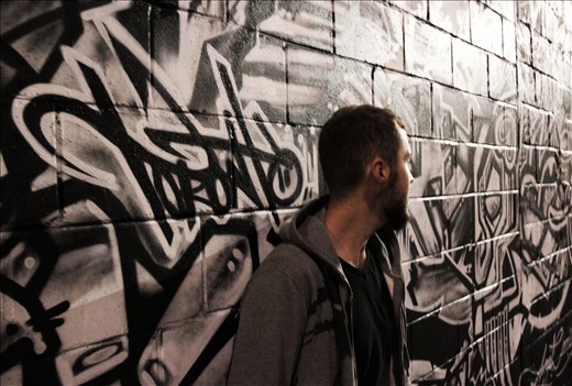 A friend of mine downtown Toronto conveniently placed in front of some graffitti