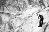 The group leader performs a balancing act and braves the steep slopes of the glacier to create footholds for the group to explore untouched parts of the glacier. : by jayant, Views[266]