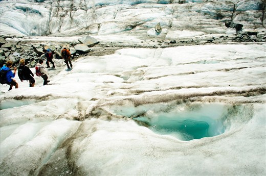 The glacier provided some stunning sights along the way. On the way back down to the base, the group walks past a deep pool of aqua coloured water. Such pools are created by large rocks that cascade down from mountain slops and rest on the glacier. Rocks absorb the heat from the sun and melt the glacier ice to create the void which fills with fresh water.