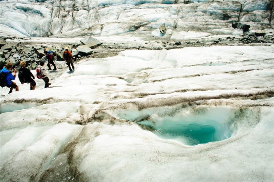 The glacier provided some stunning sights along the way. On the way back down to the base, the group walks past a deep pool of aqua coloured water. Such pools are created by large rocks that cascade down from mountain slops and rest on the glacier. Rocks absorb the heat from the sun and melt the glacier ice to create the void which fills with fresh water.