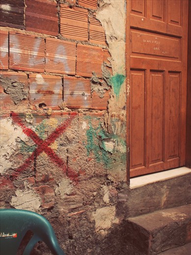 X marks the building to be demolished by the goverment in way of the olympics.