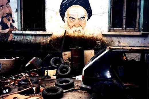 Beirut wall and burnt out car