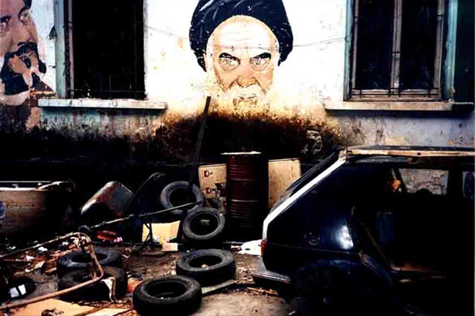 Beirut wall and burnt out car