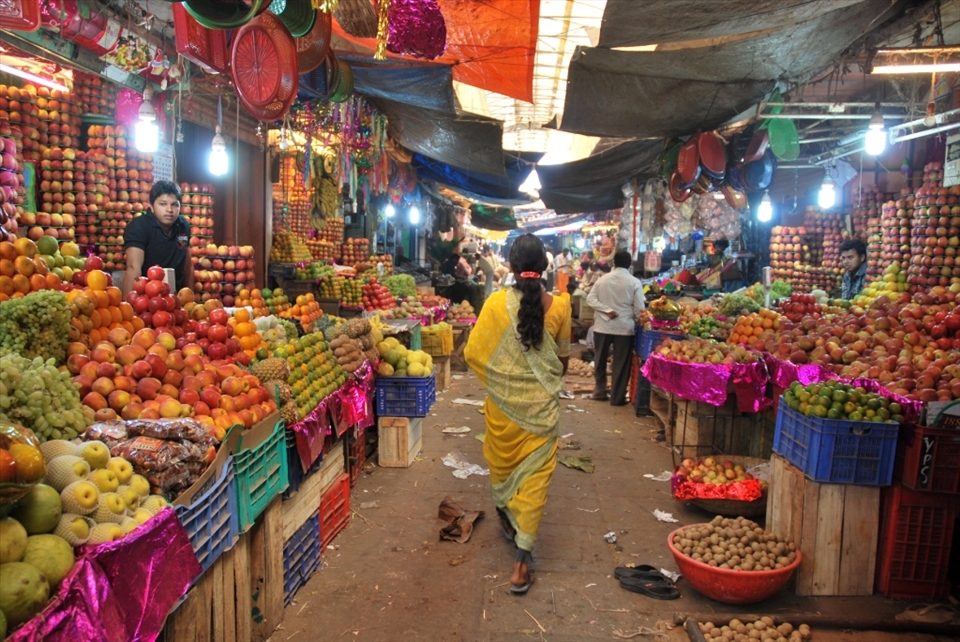 “Sensory Overload”.  One of the first things I noticed when I arrived in India was how bombarded my senses were with so many colors, new sights and smells, a constant soundtrack of car horns, people talking and even cows, and of course such a wide variety of fresh produce and foods to taste at the numerous markets around. This scene in Mysore’s Devaraja market captures a small piece of that commotion – the colorful displays of fruit, curious faces and so many little things that demand your attention.
