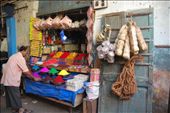 “Family business”.  This shopkeeper tidies bowls filled with colorful kum kum powder in his family business. Many of the small shops like this are passed down from one generation to the next and many of the shopkeepers seem to enjoy talking and interacting with others in the busy market. One young shopkeeper proudly showed us his personal “facebook” – a tired notebook with pictures and short messages written by travelers from all over the world who stopped by his stand over the years. A nice reminder that curiosity about other cultures and the world around us is a universal feeling.: by jbatryn, Views[1617]