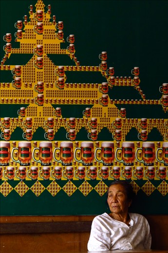 Elderly woman watching the street