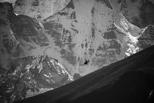 A rescue helicopter ferrying hikers back down the valley towards Lukla airport. Helicopters fly up and down to Everest base camp throughout the day, a heli tour in this part of the world can cost you up to $2500 an hour. 