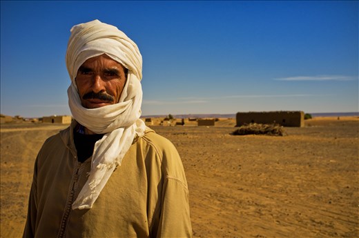Asking for direction from  a Camel Herder