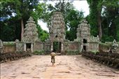 Roaming around the area with his companion dog, a man in uniform guarded the gate of one of the many Khmer temples in Angkor Archaeological Park.: by jeffpeteza, Views[293]