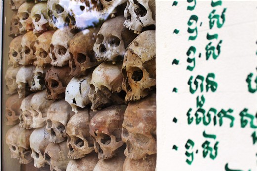 A pile of human bones and skulls kept for decades in an ornamented stupa erected on a former killing field in Wat Thmei, Cambodia.