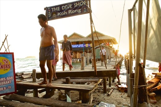 Koh Rong Island, Cambodia. Fisherman and women return from dawn fishing