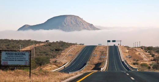 Matehuala – Saltillo highway (Tropic of Cancer), Mexico
While thinking on a romantic moment surrounded by nature, most likely we have in mind a sunrise or a sunset, both are fantastic scenes, but we cannot leash our creativity to those two events of the nature only.  It is crucial to keep our eyes open and appreciate every moment and aspect of the day that nature gives us, making them special and magical.  It was the case for this mist on the road while crossing the Tropic of Cancer in Mexico.  There was nothing else to do, but stopping the car, admire and shooting the beauty of the moment, that, maybe, will never happen again in my life.