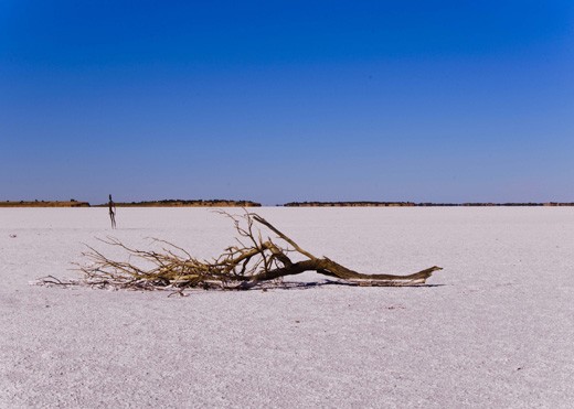 Lake Ballard Statues, Western Australia
After driving in the middle of the red soil for hours, under the extreme temperature of the Australian Outback, when the summer heat boiled every part of my body, found a fabulous dry lake, which now is turned into a massive salt bed. The bright whiteness of the salt made us jumped out the car and explore the place.  This lake inspired me to capture the power of nature, having the red soil around brilliant salt, and in the middle of the lake, those iron men standing contemplating the outlook under a deep blue sky. This was a magical place and moment, where nothing move, nothing happen, but my thoughts.
