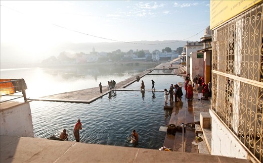 Hindus dip into sacred waters of Pushkar Lake early on a chilly winter morning