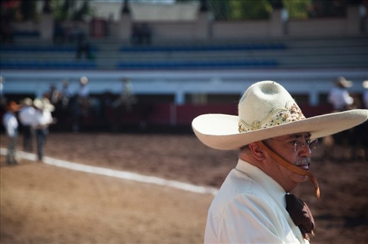 The eldest watching a team member perfoming the 